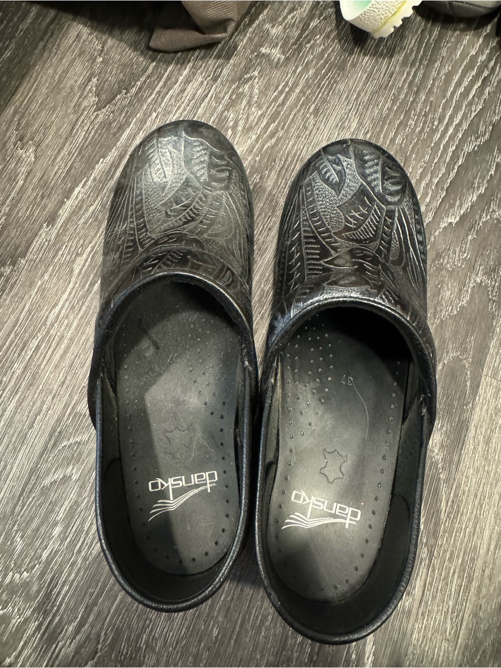 Dansko Black Embossed Leather Slip-On Clogs
